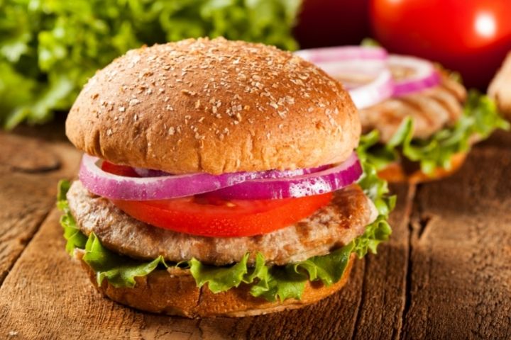 red hot chicken burger with spicy red pepper jelly